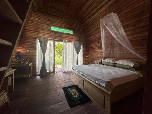 m² 1 guļamistaba, 1 privāta vannas istaba Māja Pamona
 (Bamboo House Dodoha Mosintuwu) in Tentena