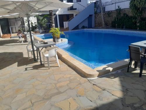Swimming pool, Two bedroom apartment with kitchen and pool near the city center in El Batey