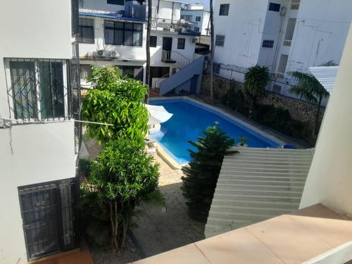 Two bedroom apartment with kitchen and pool near the city center in El Batey