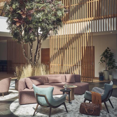 Lobby, Falkensteiner Hotel & Spa Carinzia l 4 Star Superior in Hermagor