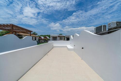 Villa Nara - Contemporary 2BR Villa with Rooftop & Near Beach - image 5