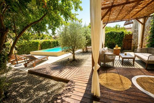 "La Belle Dame sans Regrets" Domaine de charme avec piscine chauffée, sauna et espace Bien-être entre Narbonne et Carcassonne chambre d'hôte Tournissan