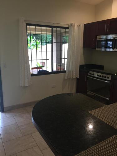 Kitchen, Guest House in Playa Flamingo