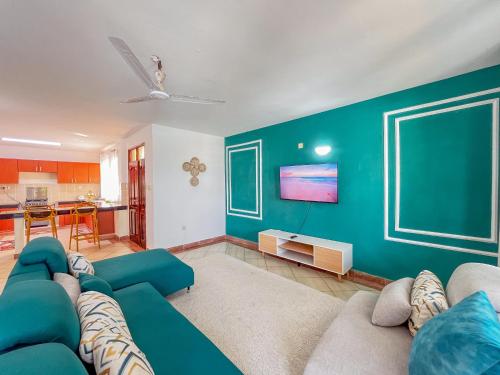 Shared lounge/TV area, Juma La Pili Beachfront Apartments in Mtwapa