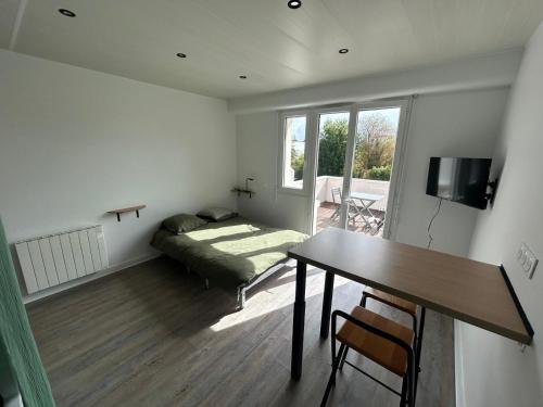 Studio lumineux avec terrasse, plage à pied - Location saisonnière - Fouesnant