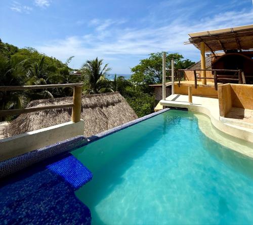 Peldbaseins, Refugio tropical con alberca, WIFI Starlink y vista al mar in San Agustinillo