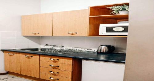 Kitchen, Ons Dorpshuis Guest House in Rustenburg