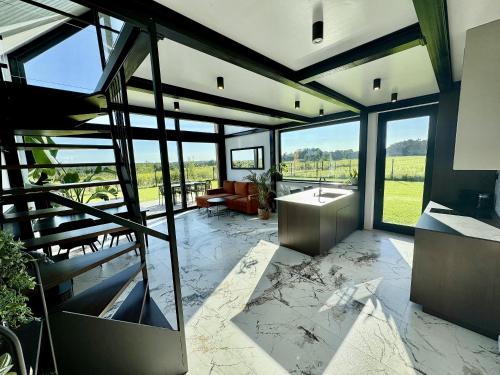 PANORAMA - domy nad jeziorem Dadaj z prywatnym jacuzzi in Barczewo