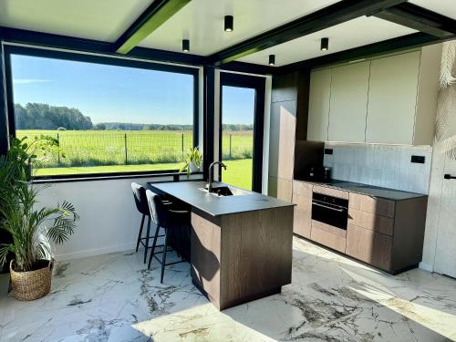 PANORAMA - domy nad jeziorem Dadaj z prywatnym jacuzzi in Barczewo