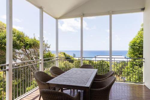 Tranquil Treetop Retreat with Pool and Ocean Views - image 2