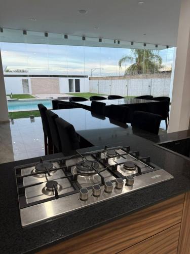 Designer Home with Private Pool & Fire Pit in Ixtlahuacán De Los Membrillos