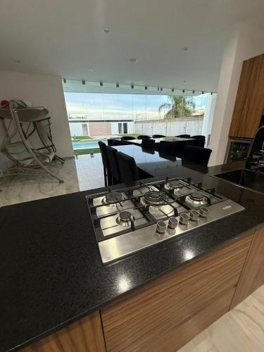 Designer Home with Private Pool & Fire Pit in Ixtlahuacán De Los Membrillos