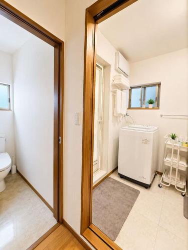 Kyoharu Stay a quiet house with direct access to Namba and Umeda Convenience store 30 seconds away o in Nishinari Ward