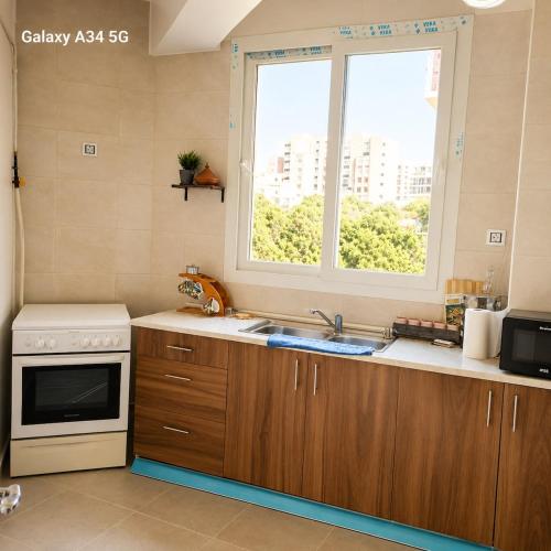 T2 spacieux avec vue mer et montagne 7 personnes residence securisee in Bejaia