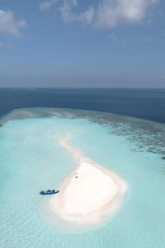 Strand, Feeali Buddies Inn in Faafu-korallzátony