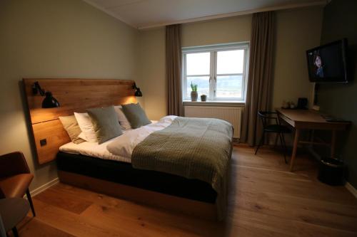 91332432 Haraldskær Sinatur Hotel & Konference