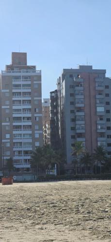 ap frente praia grande aviação 2dorm 64m 8 camas vaga estac - image 5
