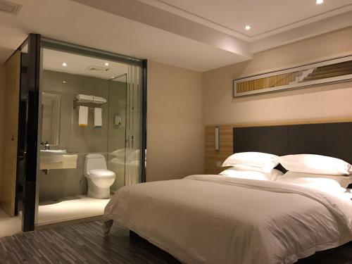 Hotel Pomelo Premier 西柚臻选武昌站酒店 in Suining