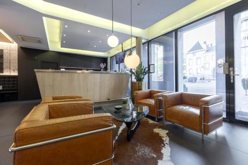 Empfangshalle, Amosa Liege City Centre Hotel in Lüttich