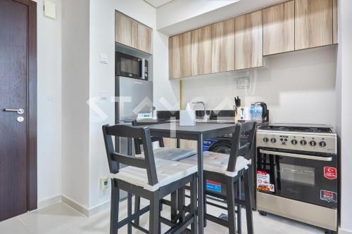 Staycae Holiday Homes - Golf Vita, DAMAC Hills near Dubai Studio City