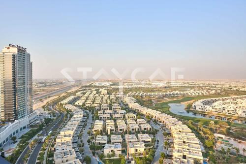 Staycae Holiday Homes - Golf Vita, DAMAC Hills near Dubai Studio City