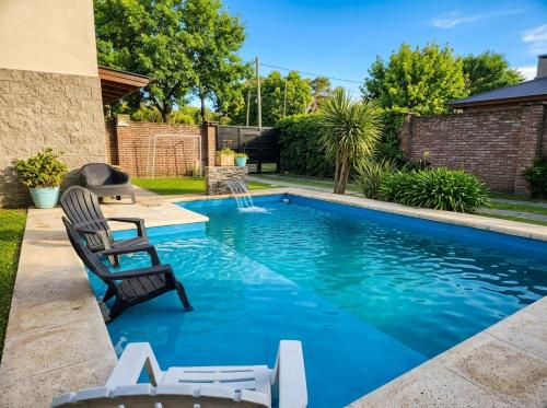 Exterior view, Casa con piscina y quincho, para familias in Funes