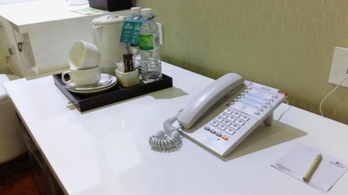 菲尼希旅行者酒店 Travellers Hotel Phinisi