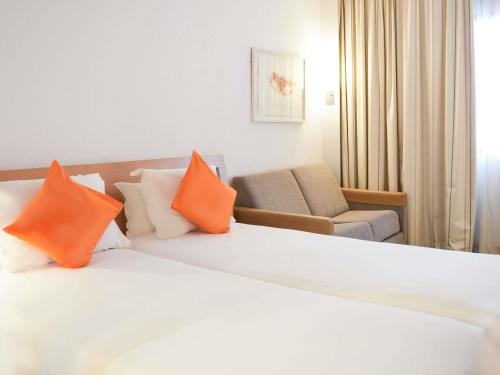 Novotel Tunis Room Type - Superior Room with 2 single beds and sofa