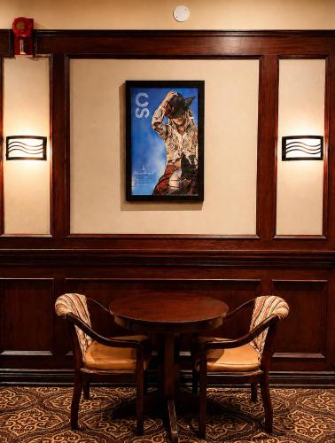Restaurant, Divya Sutra Plaza and Conference Centre Calgary Airport in Calgary (AB)
