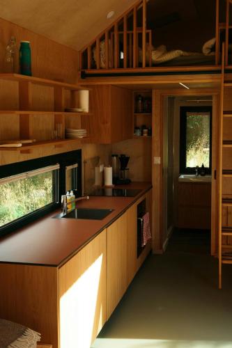 Tiny house between field and forest at Storberget in Elverum