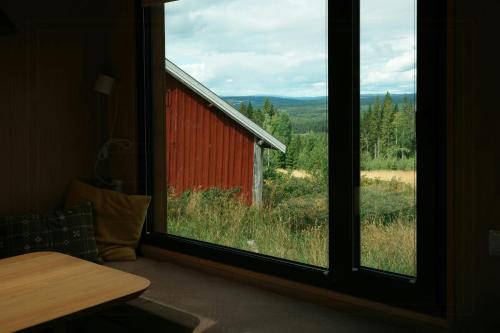 Tiny house between field and forest at Storberget in Elverum