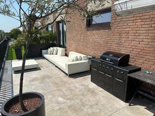 Luxe panoramische penthouse met hottub met 2 slaapkamers in Kontich