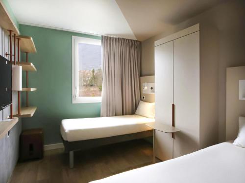 Chambre triple, 3 lits
