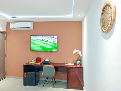 Family House Assinie - Hôtel & Villas (Family House Assinie - Hotel & Villas) in อัสซินี-มาเฟีย