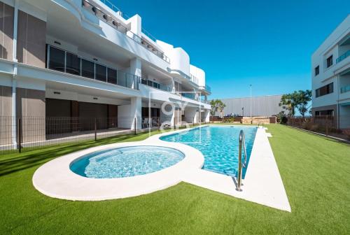 Pilar Sunplace Deluxe, groundfloor resort apt with pool and garden view, by OYOOSTAYS