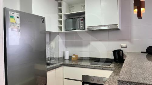 кухня, Departamento para pareja con vista al mar in Антофагаста
