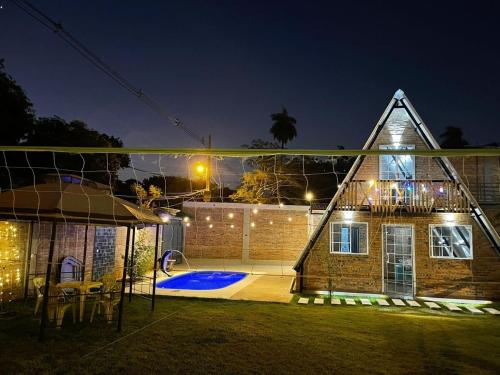 Alpine cabin with private pool in Capiata