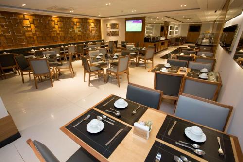 Restaurant, Petit Rio Hotel in Catete