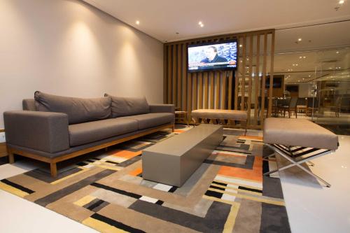 Shared lounge/TV area, Petit Rio Hotel in Catete