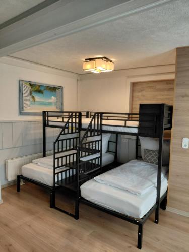 1 queen bed, 3 bunk beds