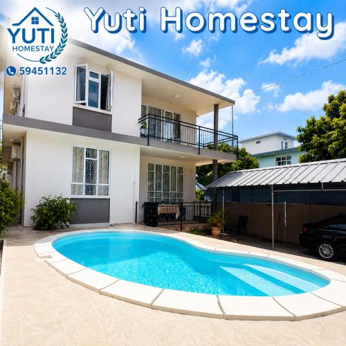 Unterkunft von außen, Yuti Homestay - Stunning 3BR Apartment with Pool - Sleeps 6 - Prime Location in Quatre Bornes