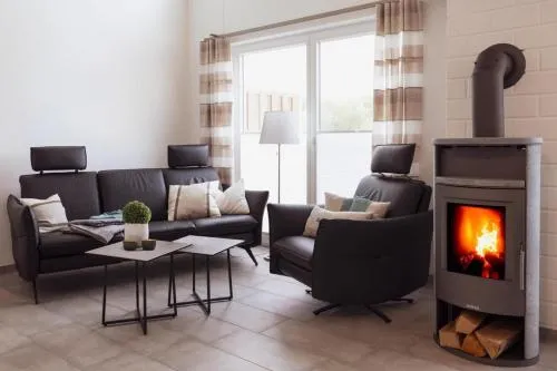 Haus Norwald - tolles Ferienhaus direkt am See für bis zu 4 Personen mit Sauna und Kaminofen - Haustiere herzlich willkommen in Nordhorn, Deutschland