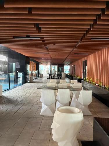 Banquet hall, Onelink - Modern & Spacious 1BR Views with Large Murphy Bed - Resort Pool in Madinat Zayid