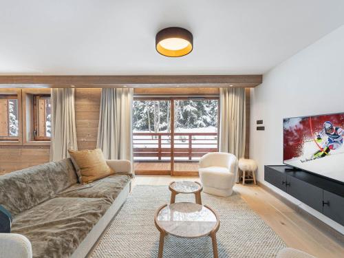 Appartement neuf avec terrasse, 2 chambres près des pistes, sauna, hammam, salle de sport, parking