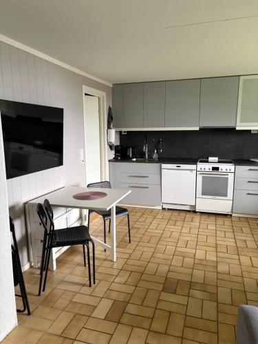 Kitchen, One-bedroom apartment in Straumsbukta