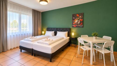 CROWN LIVING Babylon Studios Lustenau - Studios nahe Messe und Schweizer Grenze, WLAN, kostenloser Parkplatz, Self Check-in, ideal für Geschäftsreisende und Feriengäste 4