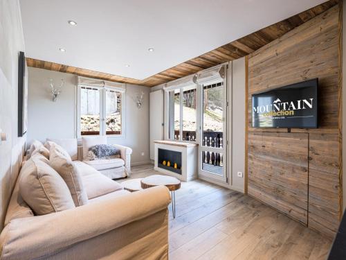 Appartement rénové, ski aux pieds, parking inclus