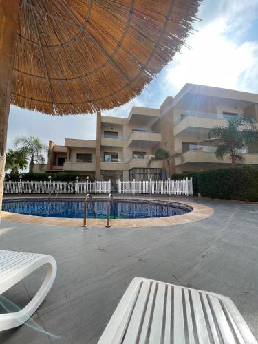 Appartement 2 chambres de luxe en Residence de luxe avec 6 piscines in Saidia