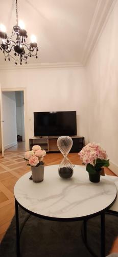 Grand appartement familial, proche ONU et gare, 3 chambres et canapé-lit