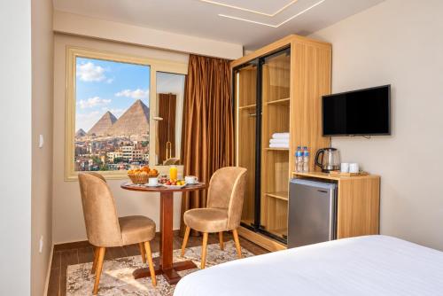 Rotana Pyramids View - image 3